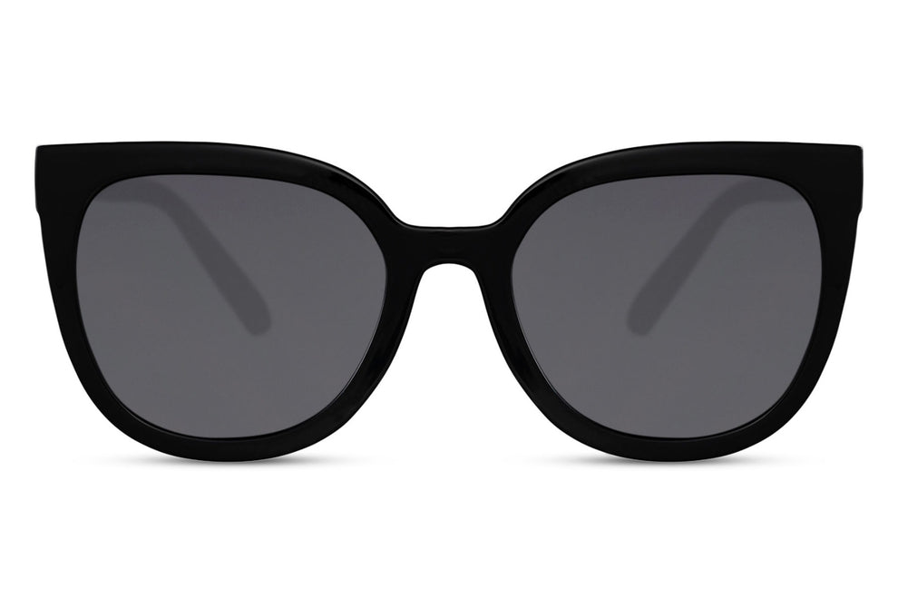 Black oversized cat eye sunglasses with dark tinted lenses