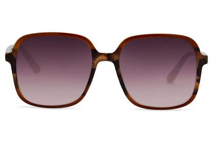Oversized sunglasses with brown gradient lenses and structured frame, inspired by contemporary European fashion and daily wear