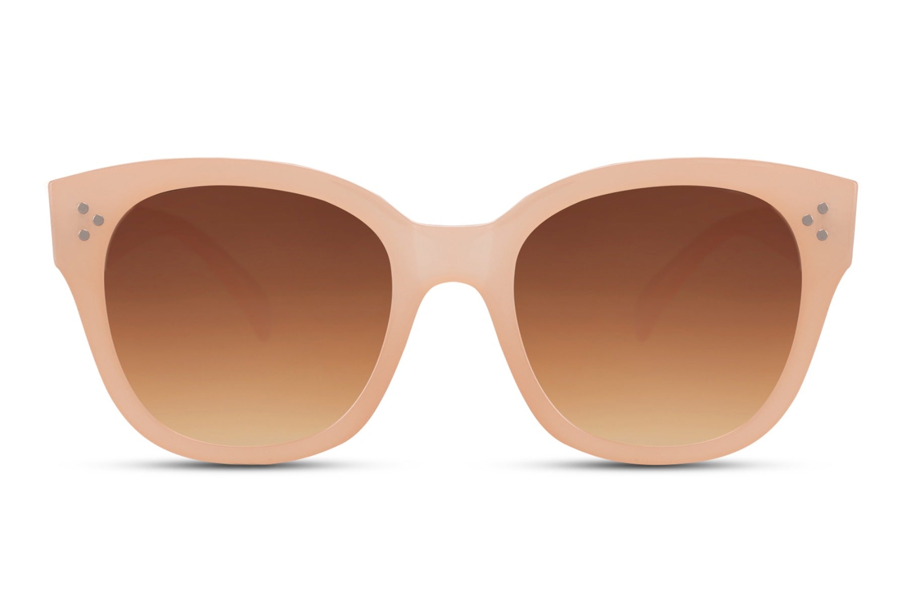 Oversized sunglasses with neutral frame and warm tinted lenses, inspired by leopard print style and modern minimalist fashion