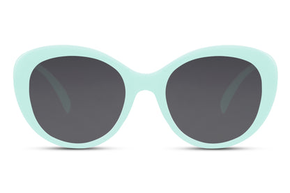 Mint green cat eye sunglasses with bold oversized frame and dark tinted lenses