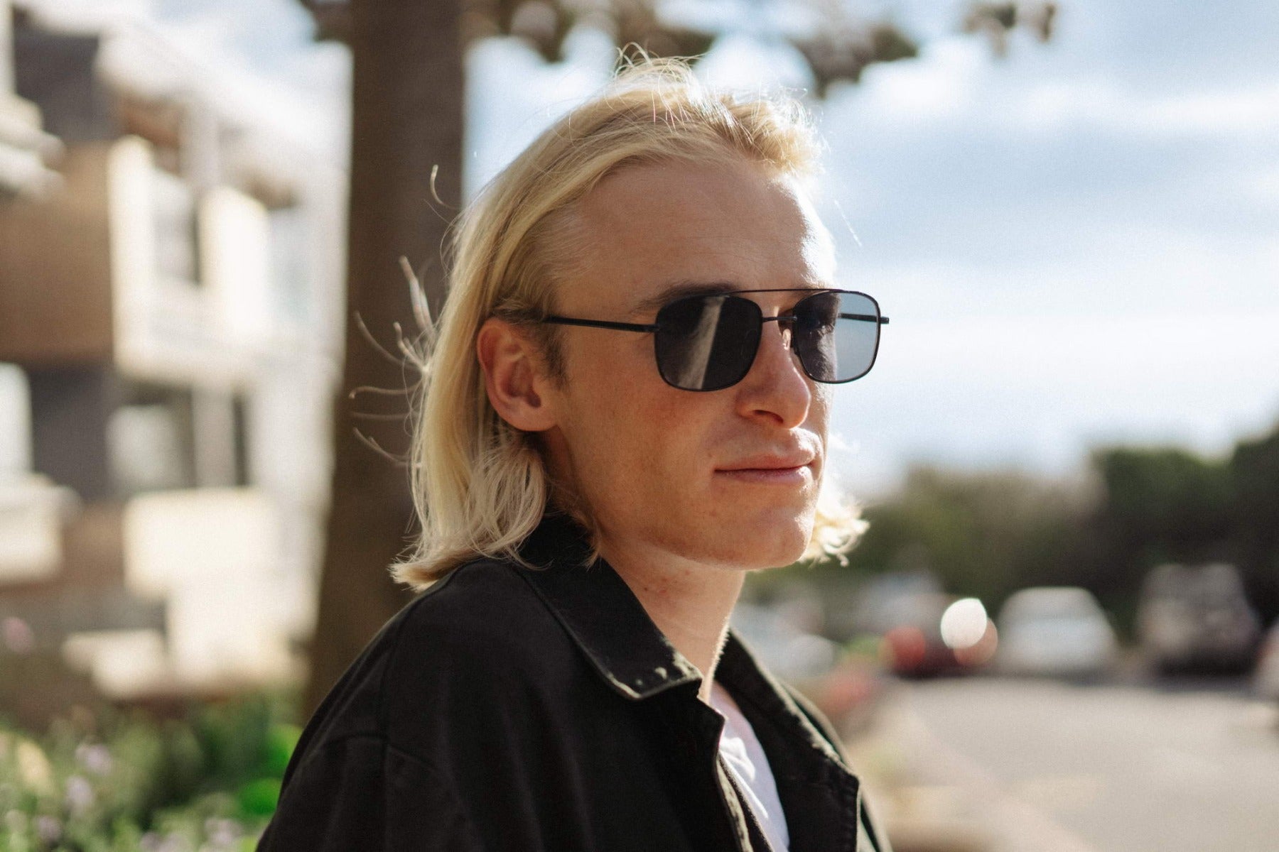 Retro square aviator sunglasses worn in a street style setting, ideal for urban fashion and everyday wear
