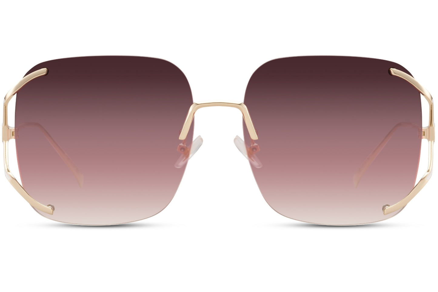 Rimless oversized sunglasses with pink gradient lenses and gold detailing, stylish statement sunglasses for women ideal for vacation and beach looks