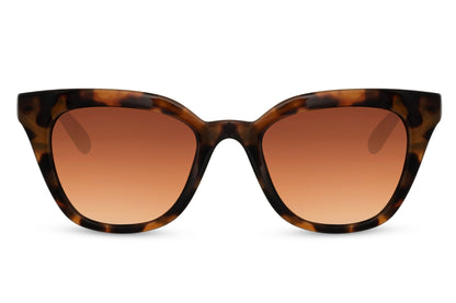 Tortoiseshell cat eye sunglasses with soft stroke design and warm tinted lenses, blending classic pattern with contemporary styling
