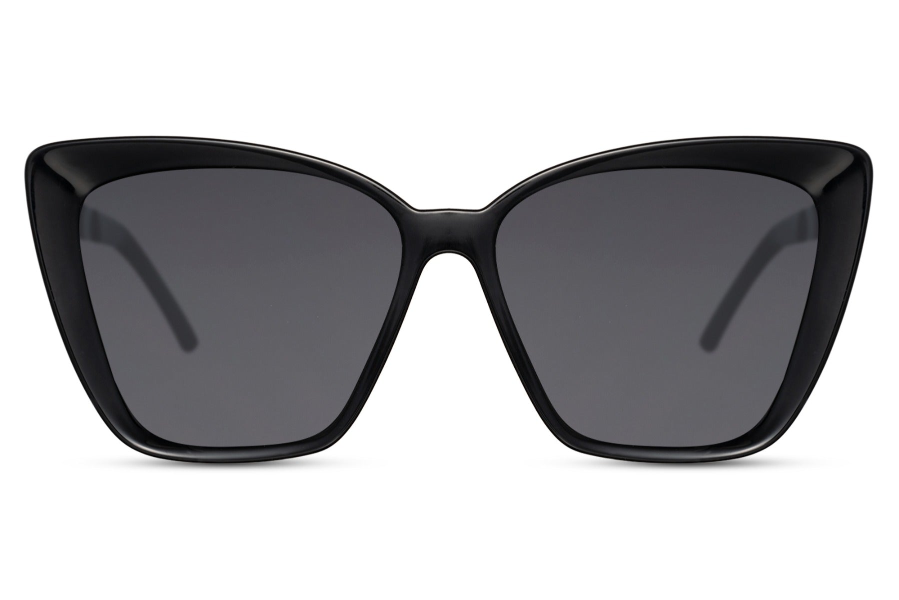 Vintage oversized black cat eye sunglasses with bold geometric frame and dark lenses, designed for statement styling and full UV protection