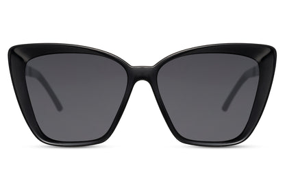 Vintage oversized black cat eye sunglasses with bold geometric frame and dark lenses, designed for statement styling and full UV protection