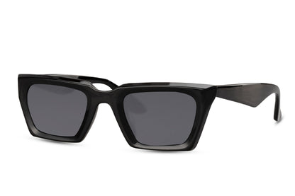 Slim Y2K cat eye sunglasses in black with narrow angular frame, perfect for minimalist streetwear and contemporary outfits