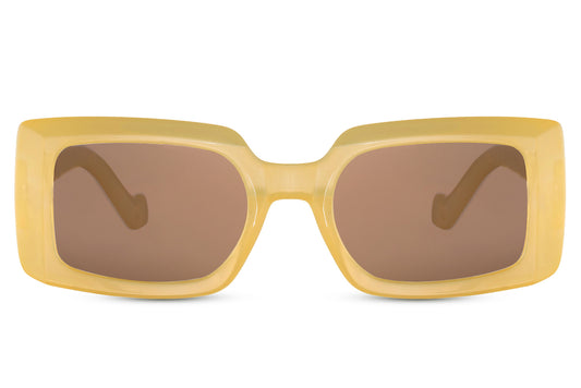 Yellow rectangle sunglasses with yellow frame and brown lenses by Sunglass Station, bold unisex eyewear with UV protection, perfect for summer styling and available with free shipping across the UK and Europe