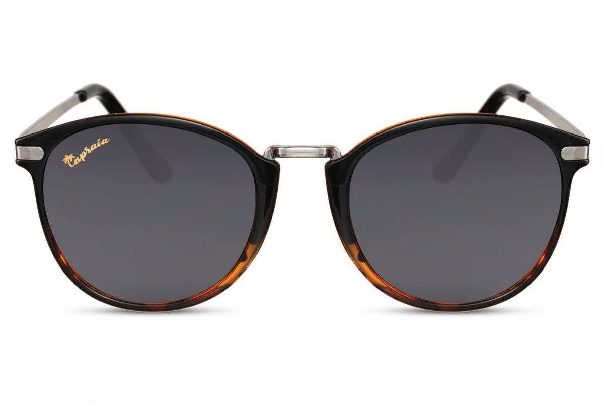 Make a statement with these Black Round Sunglasses, featuring a striking animal print frame and sleek black lenses. Designed to combine style and functionality, these sunglasses are perfect for everyday wear or special occasions.