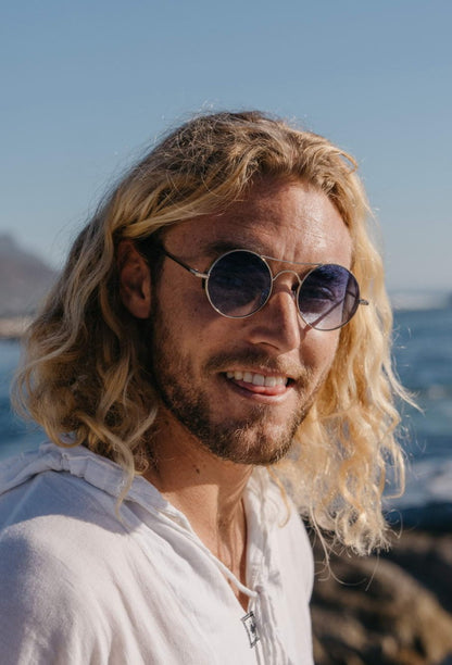 Men wearing tinted metal round sunglasses silver frame blue translucent lens UV400 protection retro vintage summer city outdoor beach holiday festival eyewear free UK Europe shipping Sunglass Station