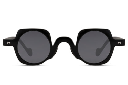 Black round geometric party sunglasses in polycarbonate — bold unisex silhouette with 6.5cm wide lens, the shape that reads equally at a rooftop rave or a creative-district afternoon