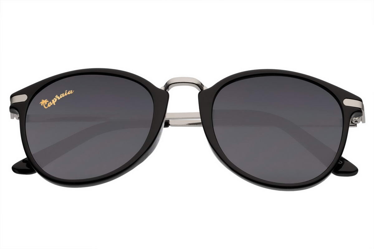Upgrade your look with these Black Round Sunglasses, blending timeless design with modern materials for unmatched comfort and style. Perfect for all occasions, they offer essential protection and versatile elegance.