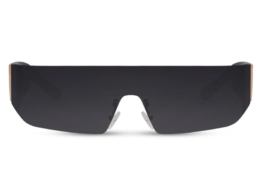Black single-lens shield visor party sunglasses — seamless frameless polycarbonate build with 7cm wide coverage, the flat shield silhouette that defines futuristic festival dressing for men and women in 2026, UV400